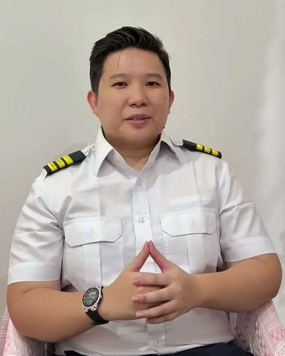 I. Arun Gomez in pilot uniform